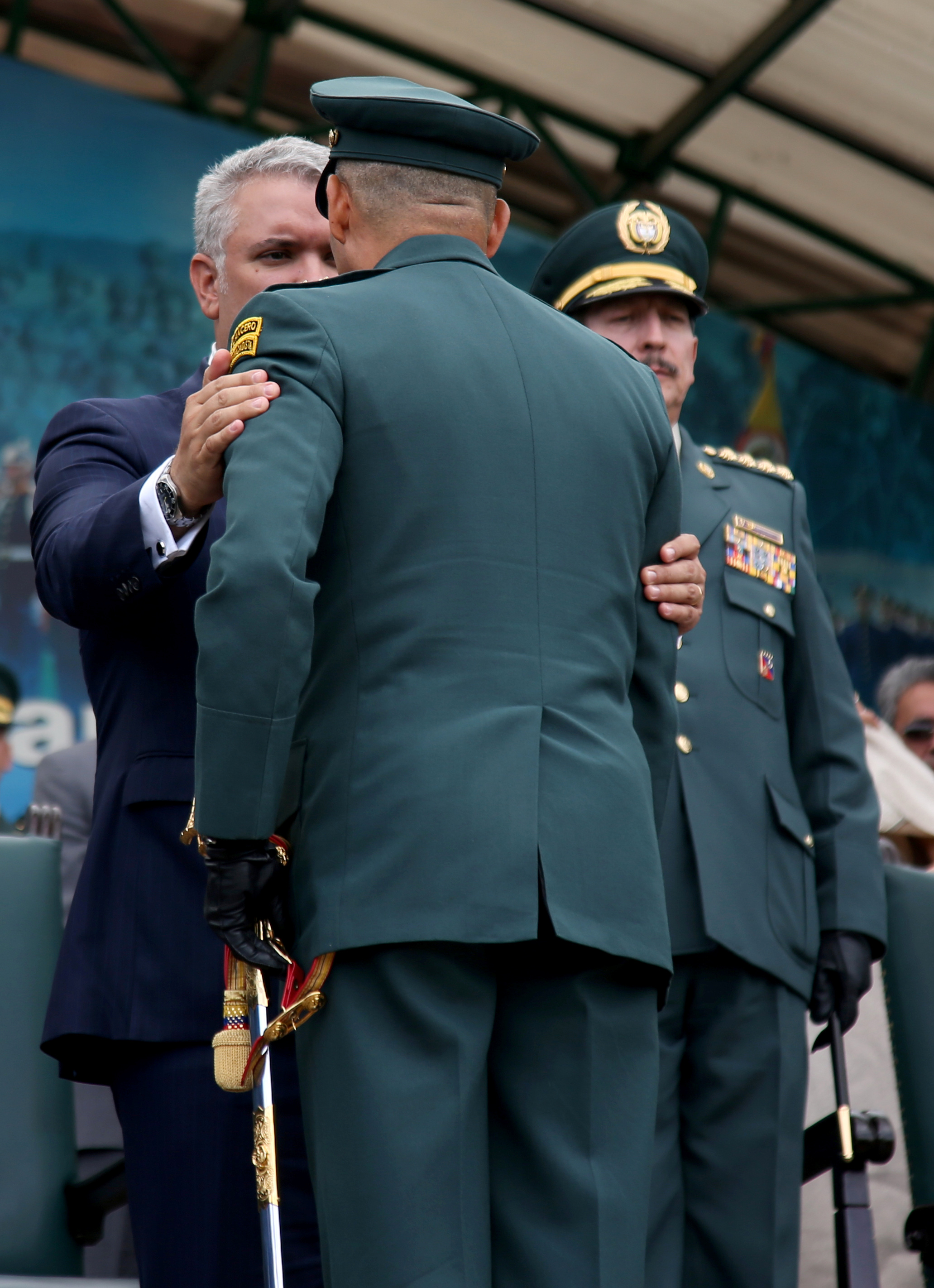 Colombian President Ivan Duque talks to the commander of the Colombian National Army, Eduardo Enrique Zapateiro, during the appointment ceremony, in Bogota, Colombia December 30, 2019. REUTERS/Luisa Gonzalez