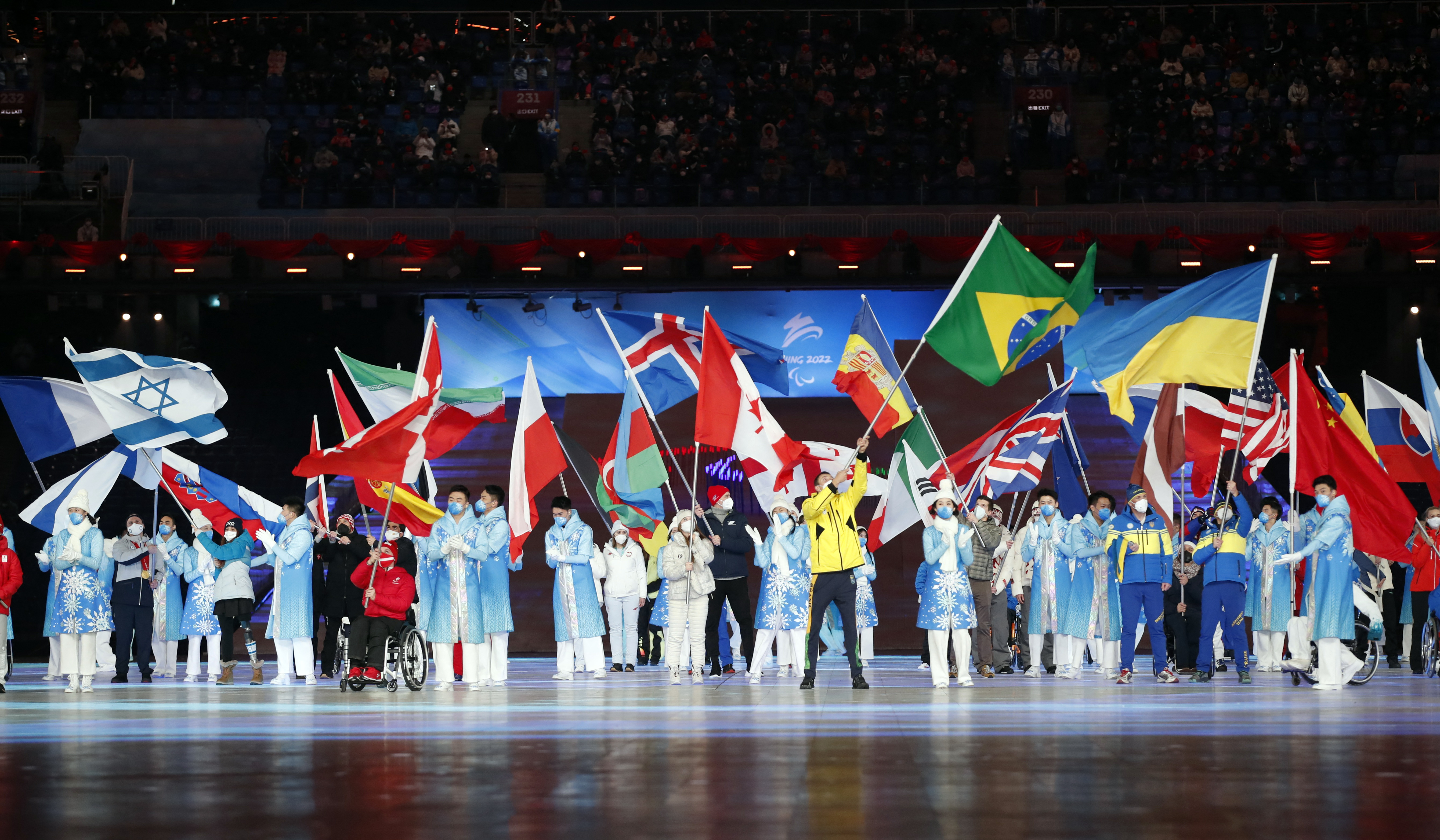 Beijing 2022 Winter Paralympic Games - Closing Ceremony - National Stadium, Beijing, China - March 13, 2022. Flagbearers are pictured during the closing ceremony. REUTERS/Peter Cziborra