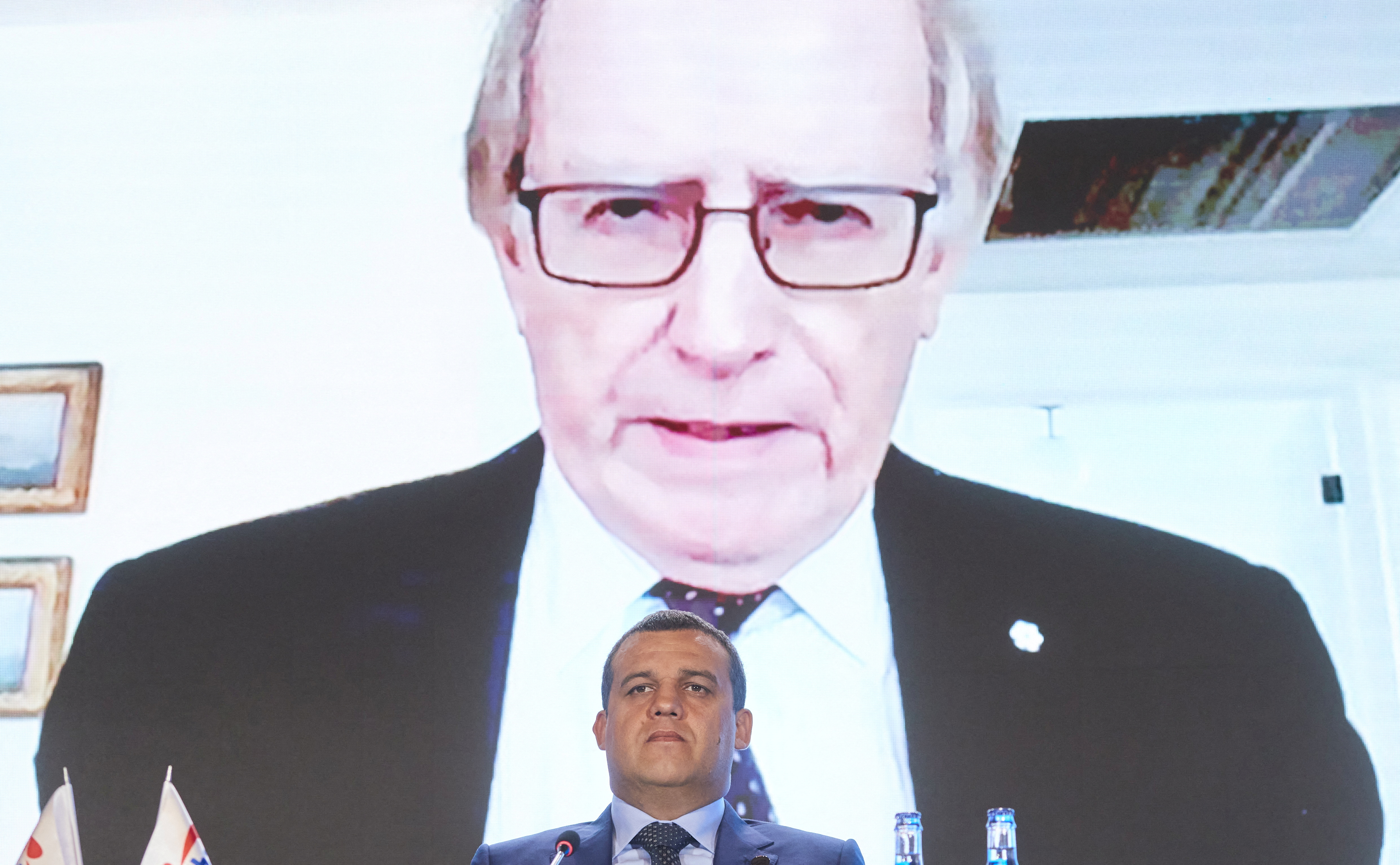 FILE PHOTO: International Boxing Association (AIBA) President Umar Kremlev listens to sports lawyer Richard McLaren during a news conference ahead of the Tokyo 2020 Olympic Games in Lausanne, Switzerland June 28, 2021. REUTERS/Denis Balibouse/File Photo