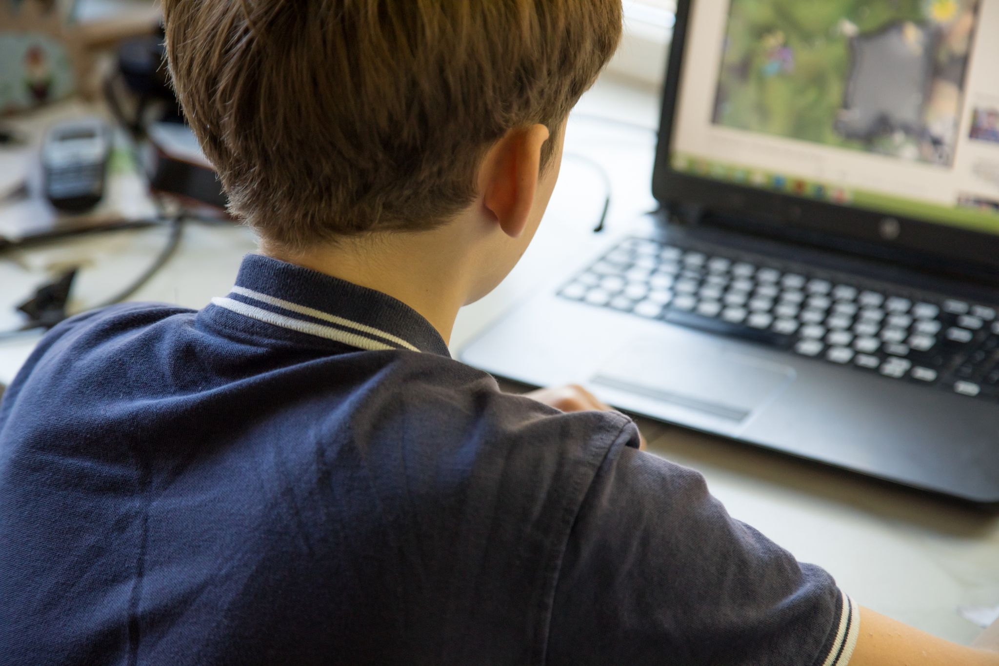 ARCHIVO - Los padres deberían probar previamente los videojuegos que frecuentan sus hijos y acompañarles en el juego, recomiendan los expertos. Foto: Christin Klose/dpa