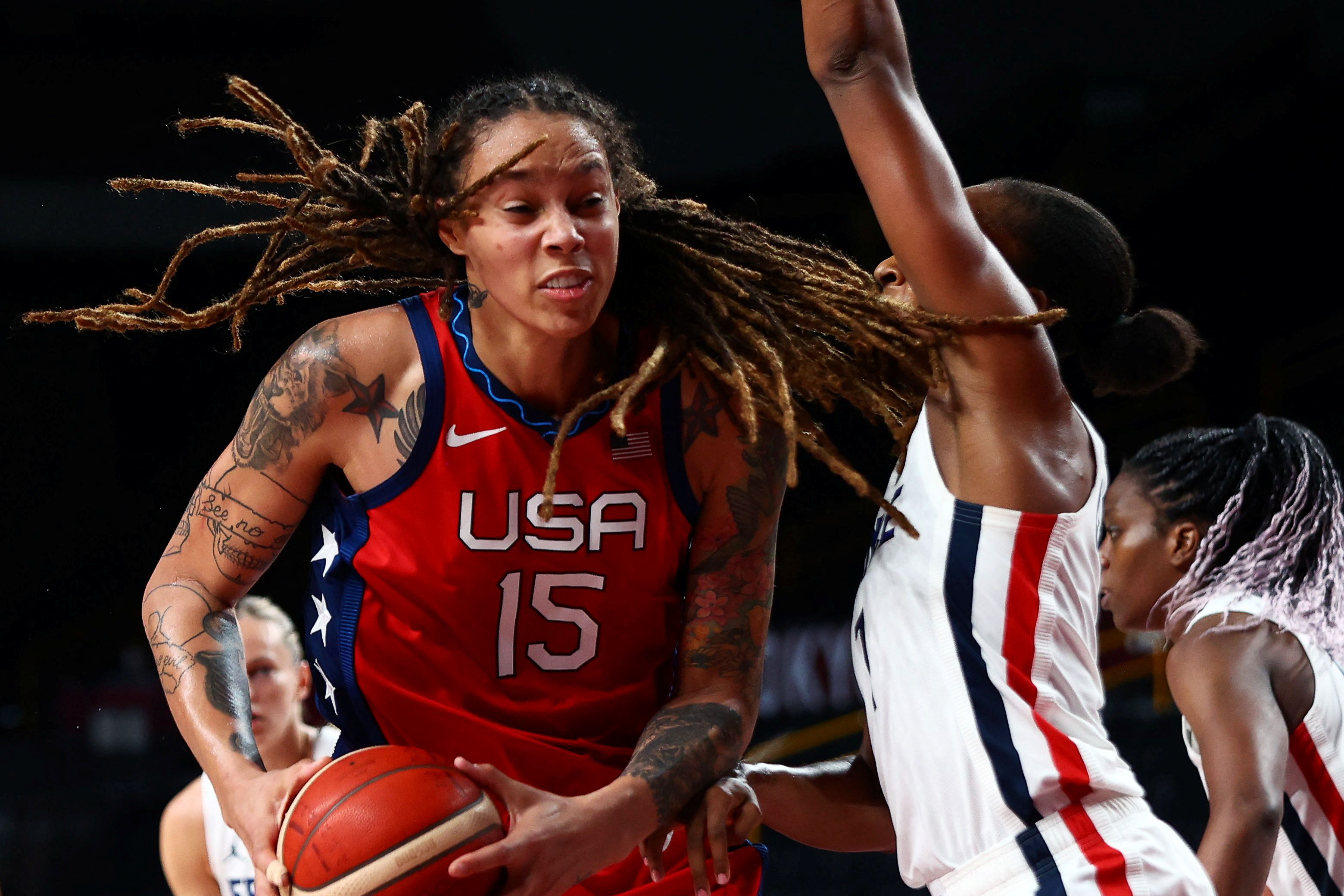 FILE PHOTO: Brittney Griner of the United States in action with Sandrine Gruda of France at Saitama Super Arena during their Tokyo 2020 Olympic women's basketball Group B game in Saitama, Japan August 2, 2021. REUTERS/Sergio Perez/File Photo